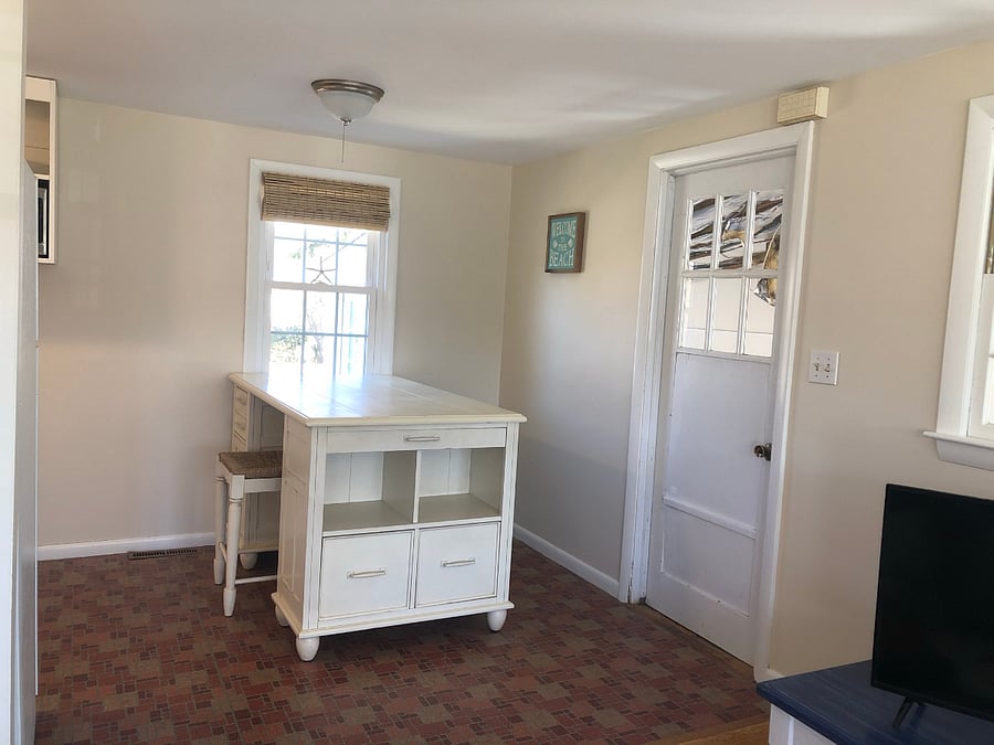 Eat-in area of kitchen; the interior door is no longer there. It is an open doorway from kitchen to dining room.