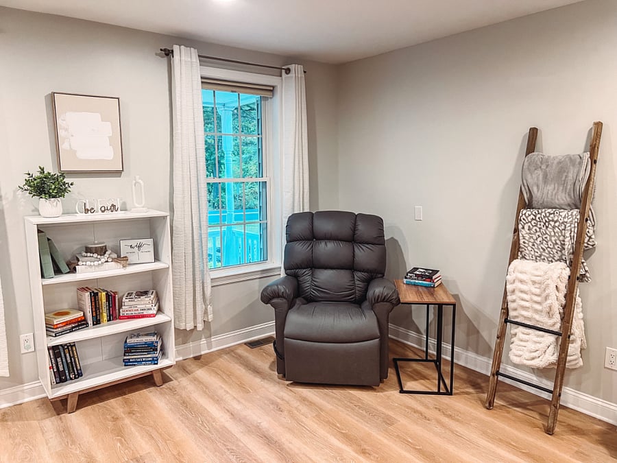A readers dream! A comfortable recliner that can even lay flat.