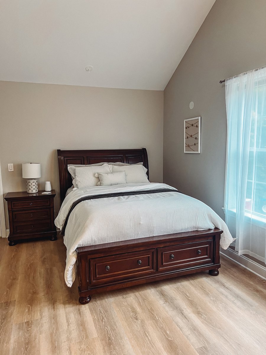 Queen Bedroom 1- with storage under bed, closet space and dresser.