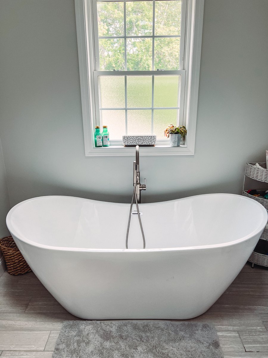 Large soaking tub, perfect for relaxing or bathing kiddos.