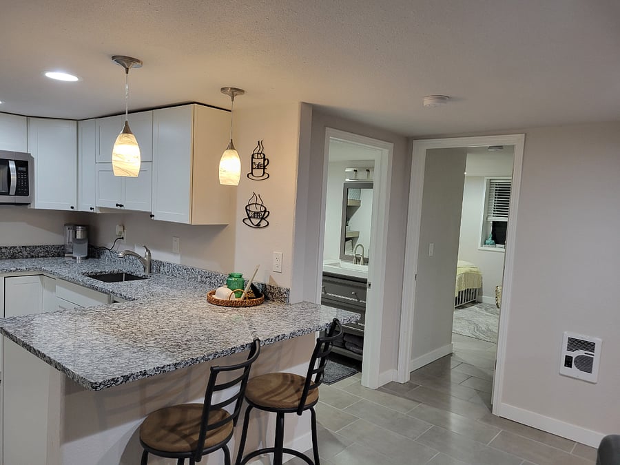 Kitchen, bathroom door left, second bedroom door on right 