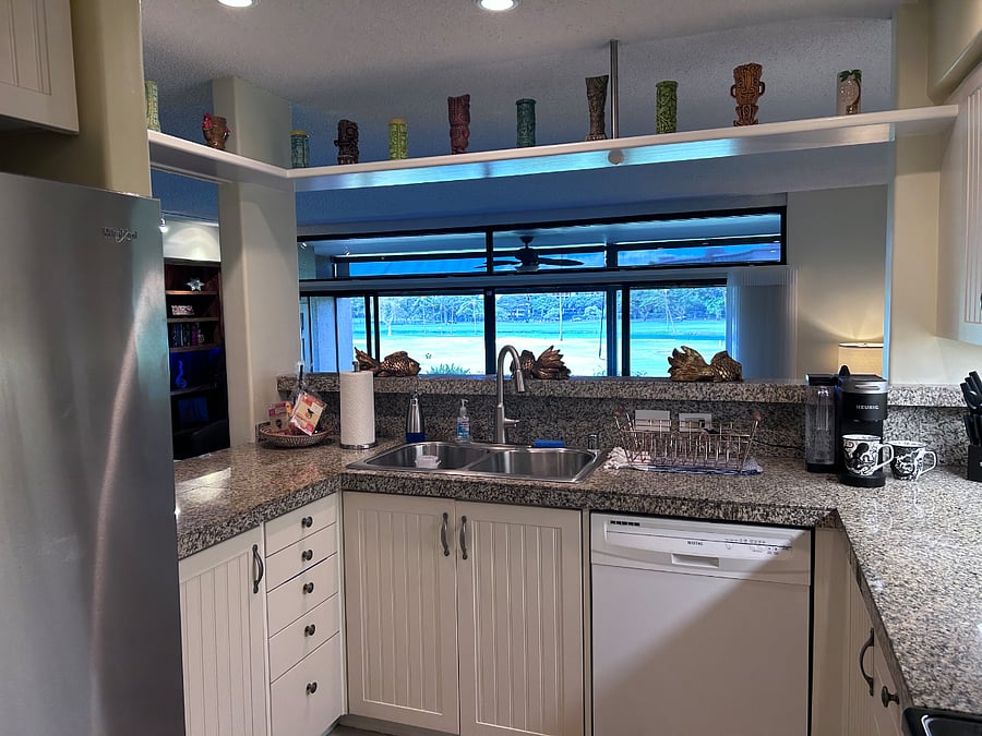 The view from the kitchen is beautiful.  It makes washing dishes less of a chore!  And it has an excellent footprint for cooking.  Everything is where it should be so, if you are a cook, you will appreciate the set up.   My husband and I were able to cook side by side in this kitchen quite easily.  And the refrigerator has a water and ice dispenser which is a really nice feature.