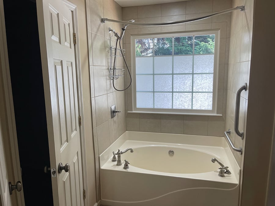 Master bath with combination tub and shower 