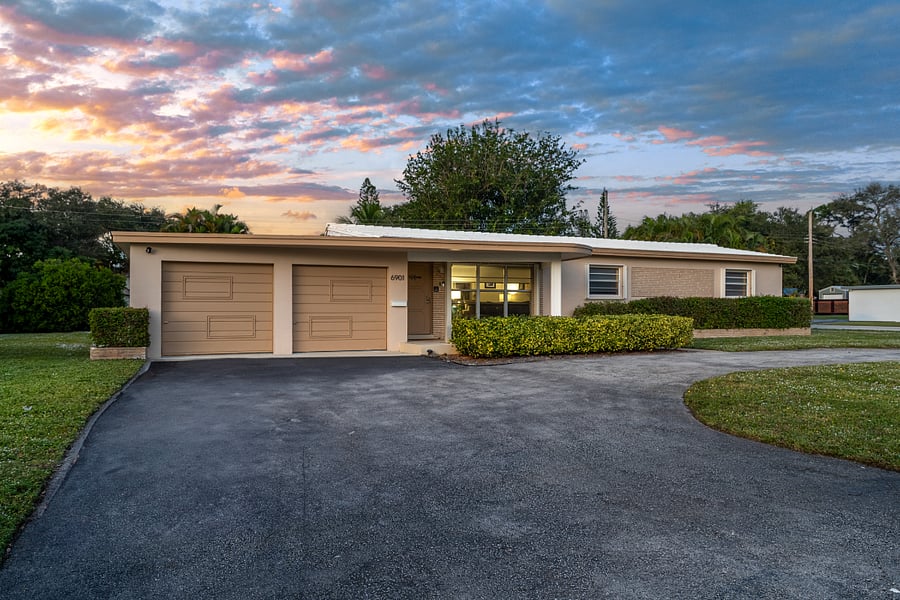 View of our beautiful home and the large drive way that can fit 9 cars or Evan an RV