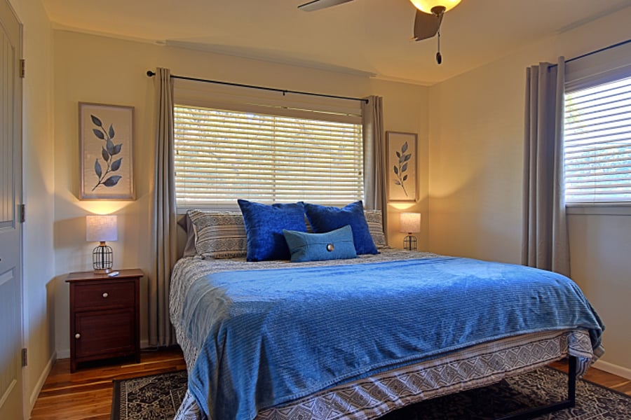 Welcome to the master bedroom! This spacious and inviting retreat features a comfortable king-sized bed, elegant decor, and ample natural light.