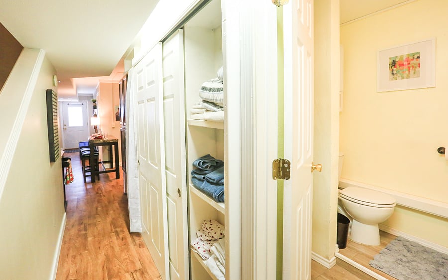 Hall linen closets (2). One with towels and sheets. The other available for storage.