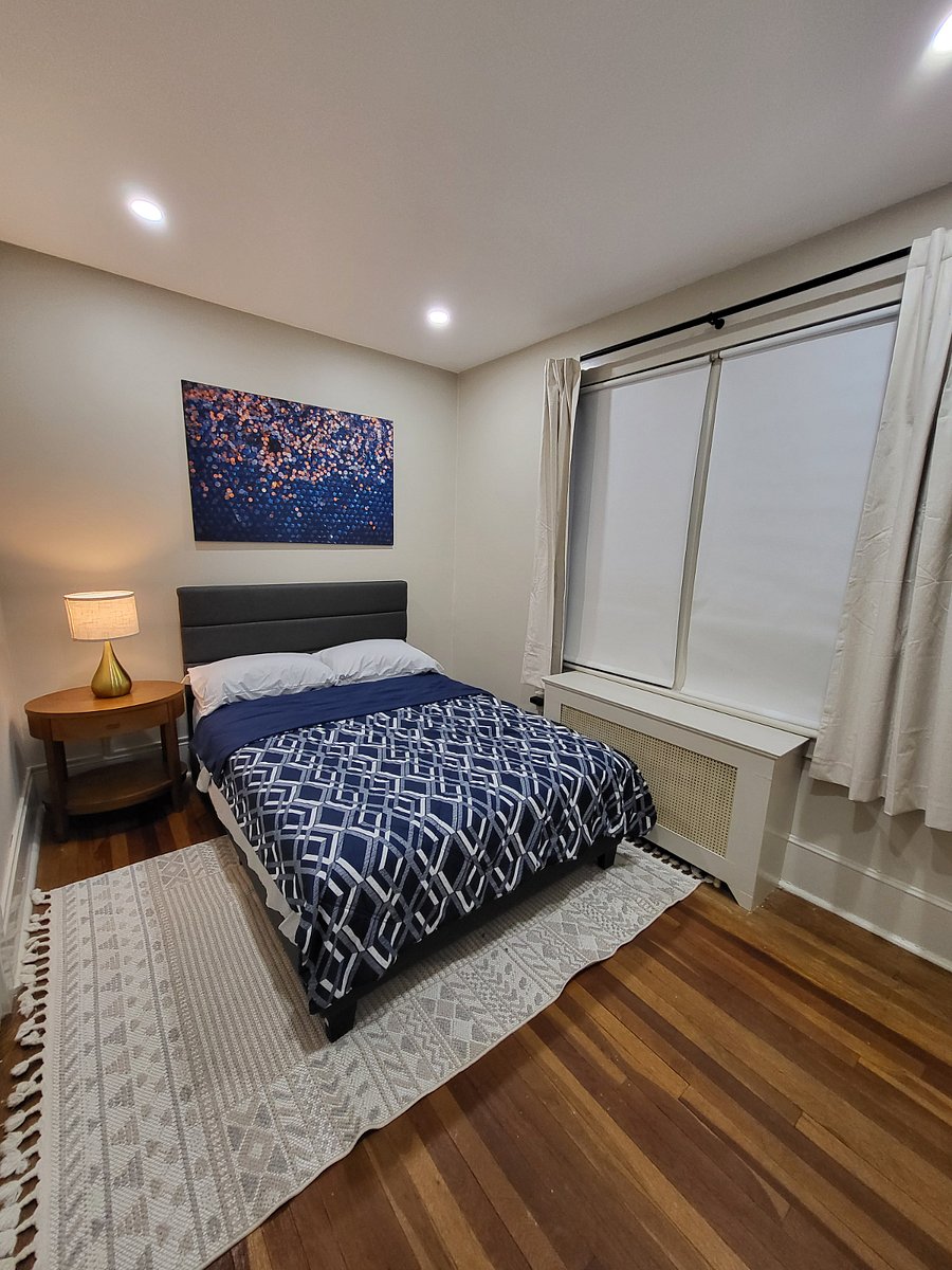 Full sized bed with plenty of closet space and air conditioning during summer months