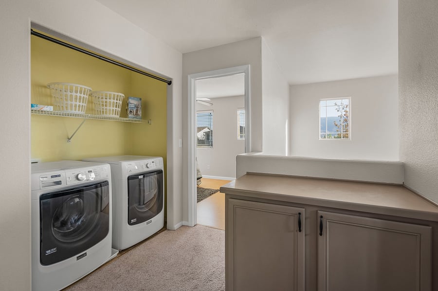 Washer/Dryer upstairs with all the bedrooms.