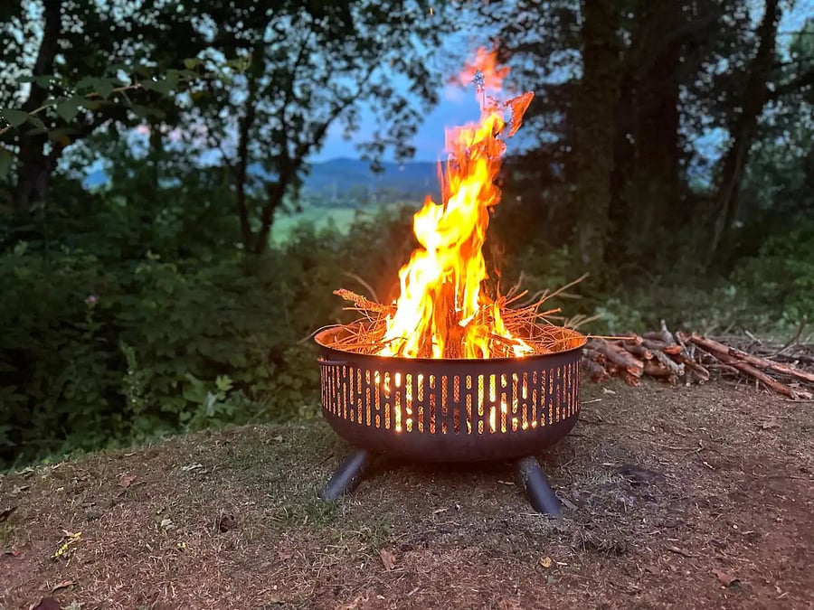 Enjoy cooler nights with a bonfire and mountains in the distance