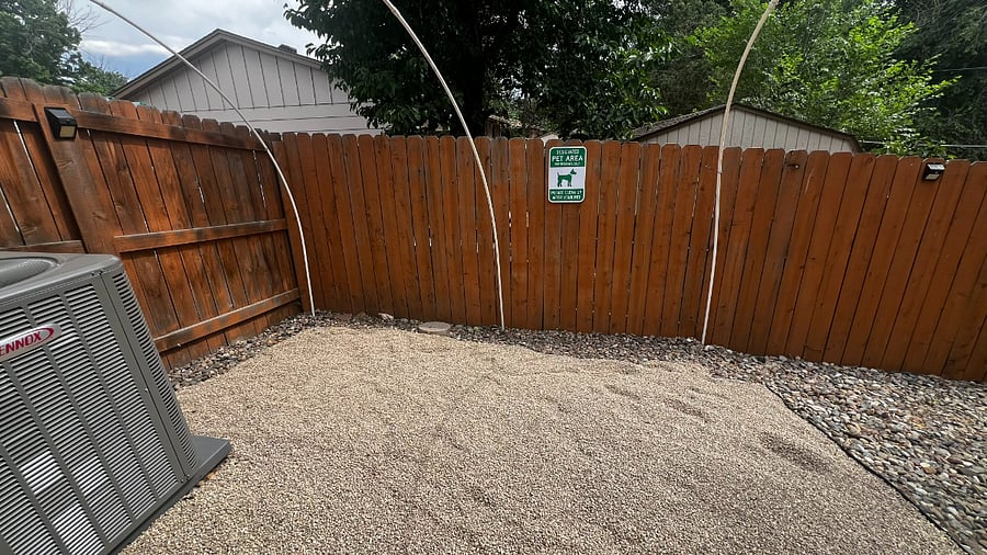 Designated pet relief area with pea gravel surface, helping to help keep the backyard clean and enjoyable for everyone. Please pick up after your pet and dispose of waste in the outdoor trash receptacle.