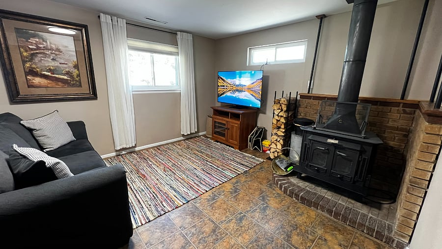 Second living room with a 55 smart TV, perfect for movie nights or giving everyone their own space to unwind.