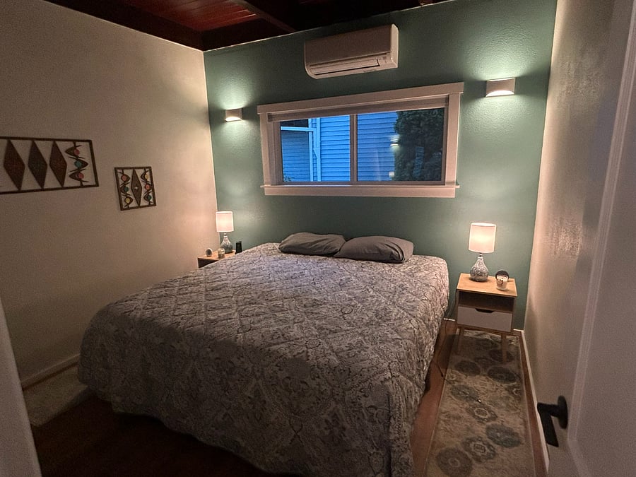 Primary bedroom with king size memory foam mattress and large closet.