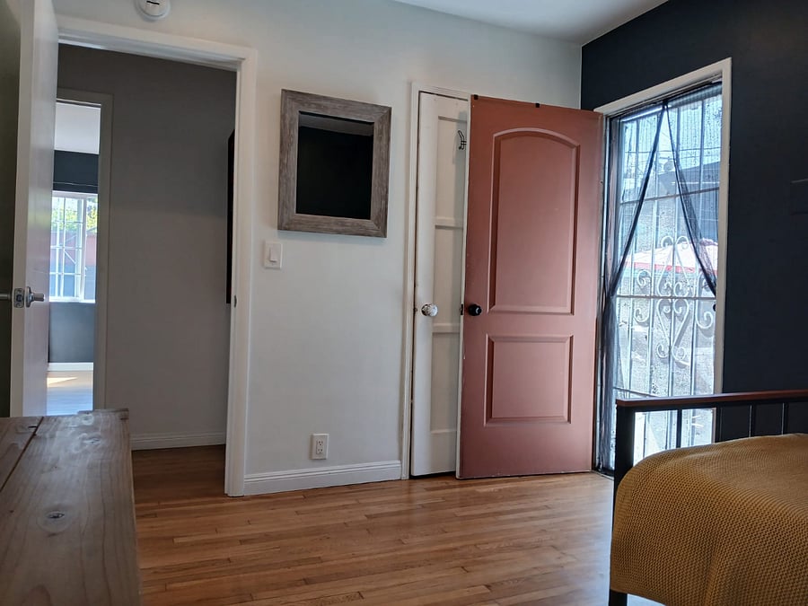 The room has access to the communal back yard.