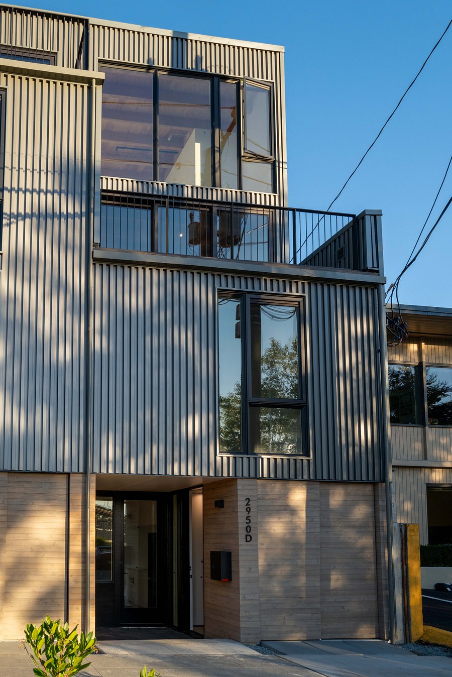 Covered entry patio provides direct access to studio unit.