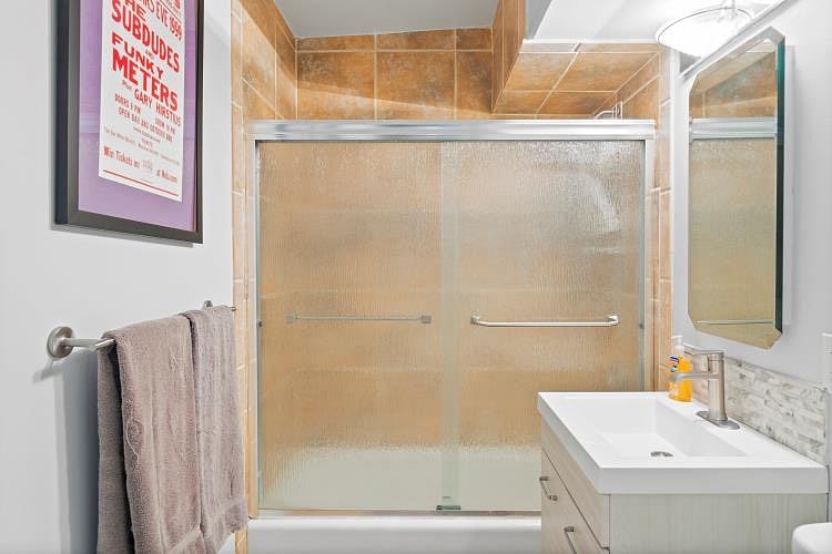 Bathroom with shower and tub