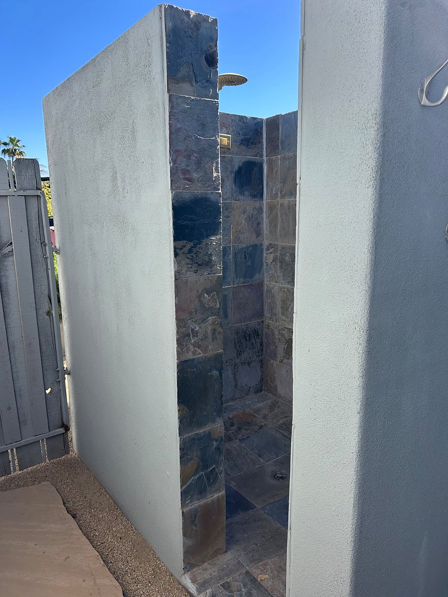 Private outdoor shower with dual heads