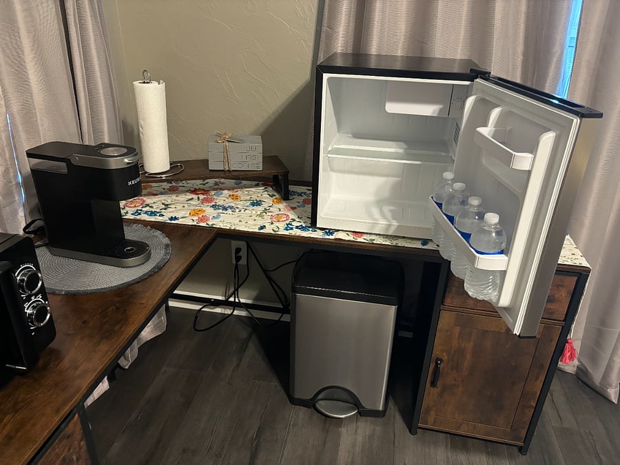 Mini fridge
The kitchenette desk has drawers/cabinet for storage.