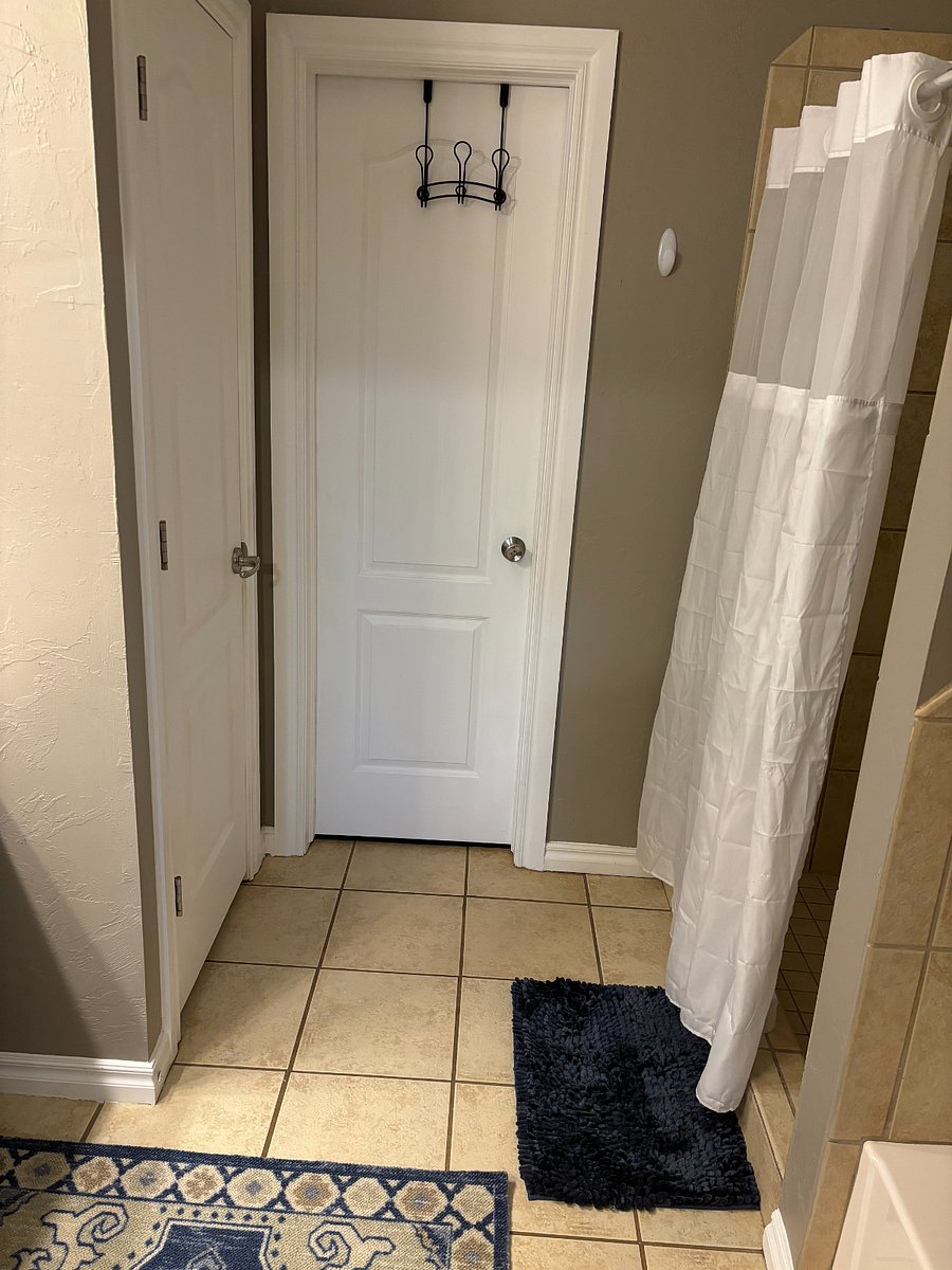 Toilet closet on the left. Large walk in shower on the right