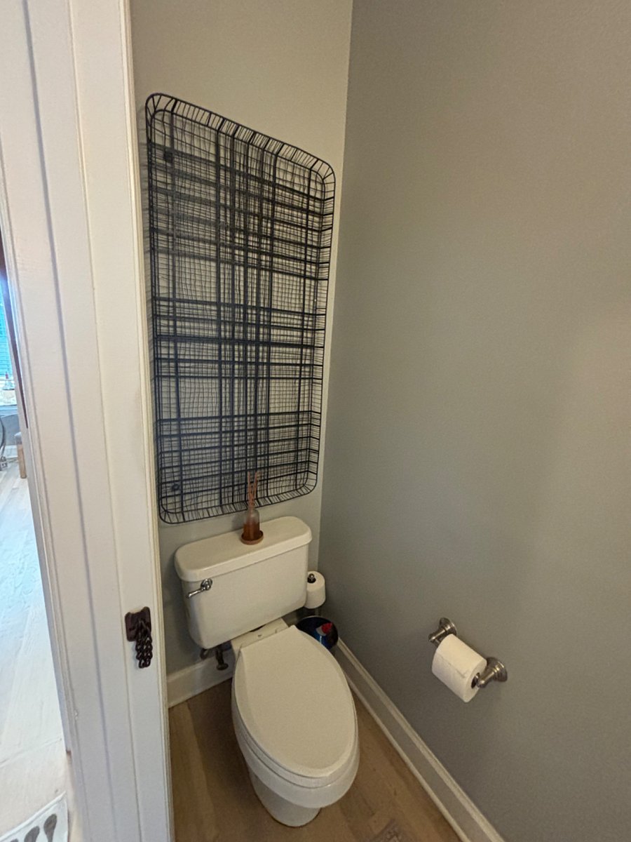 Half bath downstairs for guests.