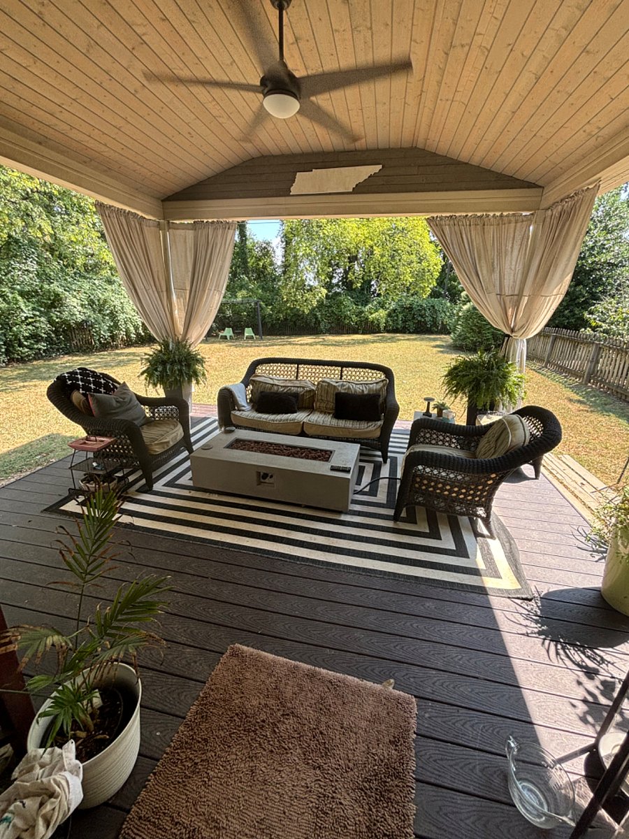 Shared Large covered backporch with TV and fenced back yard. Check out that gas fire table! So cozy year round.