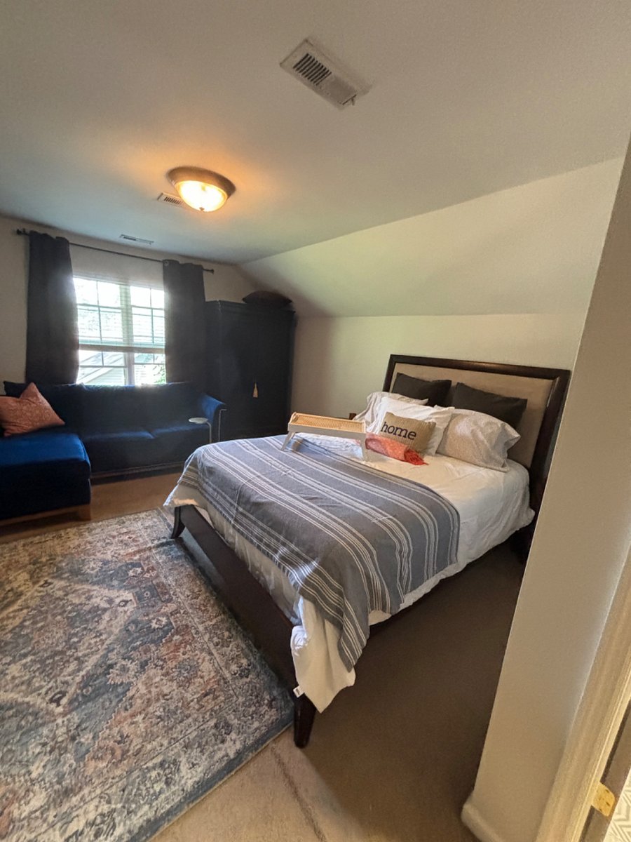 Your private Bedroom with Queen bed and pull out sleeper sofa for your occasional guest and beautiful vintage Armoire for hanging and folded clothes.