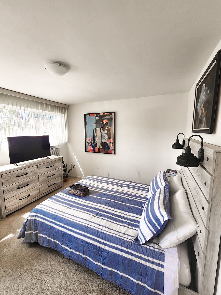 Bedroom 2 with Smart TV, Work Desk, Air-conditioner, closet and drawer space