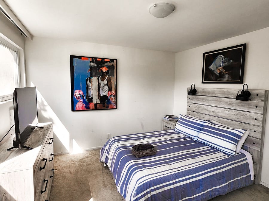 Bedroom 2 with Smart TV, Work Desk, Air-conditioner, closet and drawer space