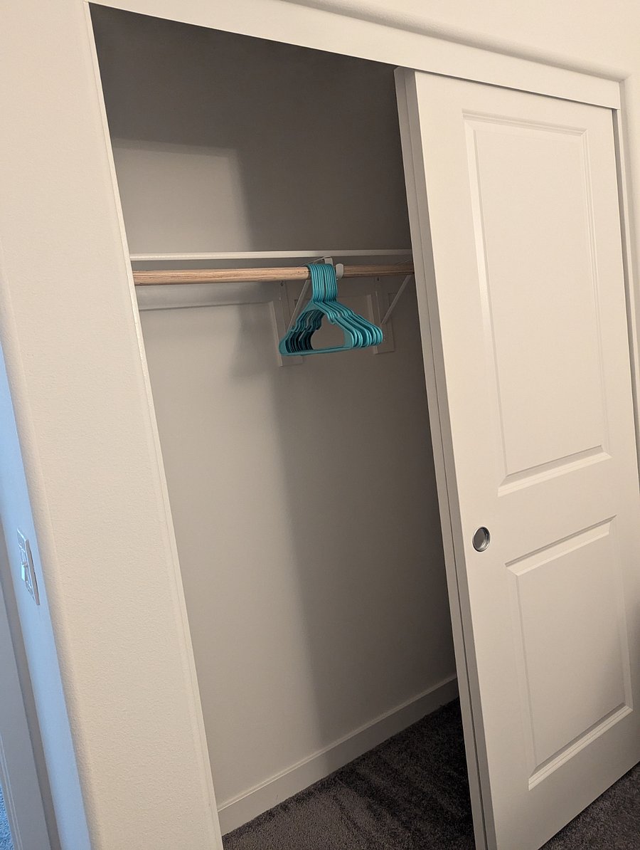 Closet / storage, hangers and hanging shelf provided