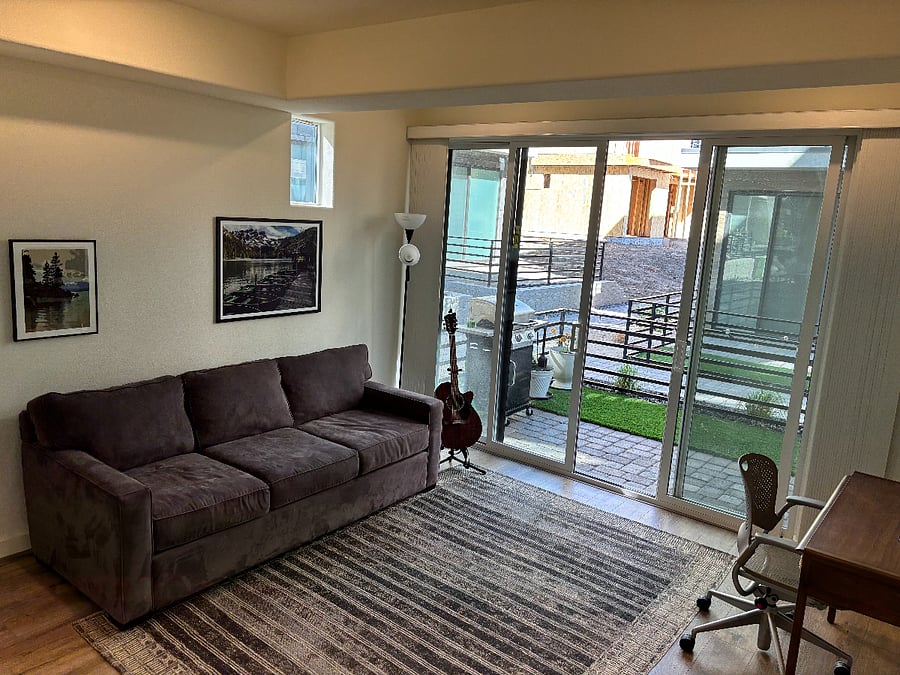 Ground floor den with double glass sliders to your patio