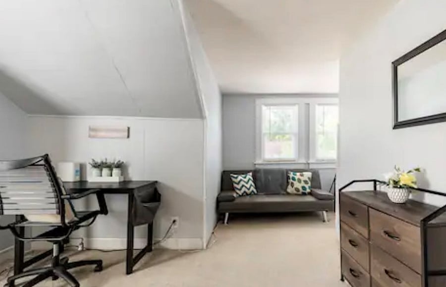 Upstairs bedroom #1 with desk and futon. (no closet)