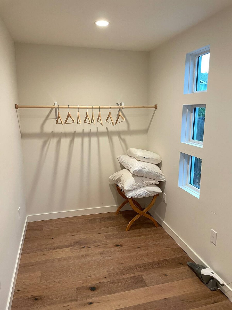 The walk-in closet also has a BRIMNES wardrobe to store your clothes.