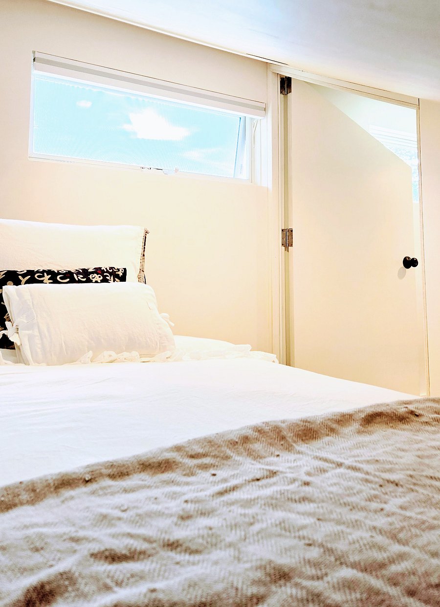 The loft bedroom has room darkening blinds, a door, and an operable window Dedicated closet and clothes storage on the first floor.