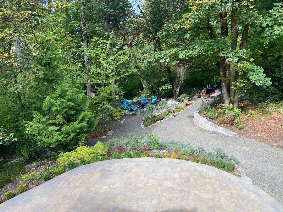 Back yard with fire pit plus and another acre to the Rock creek