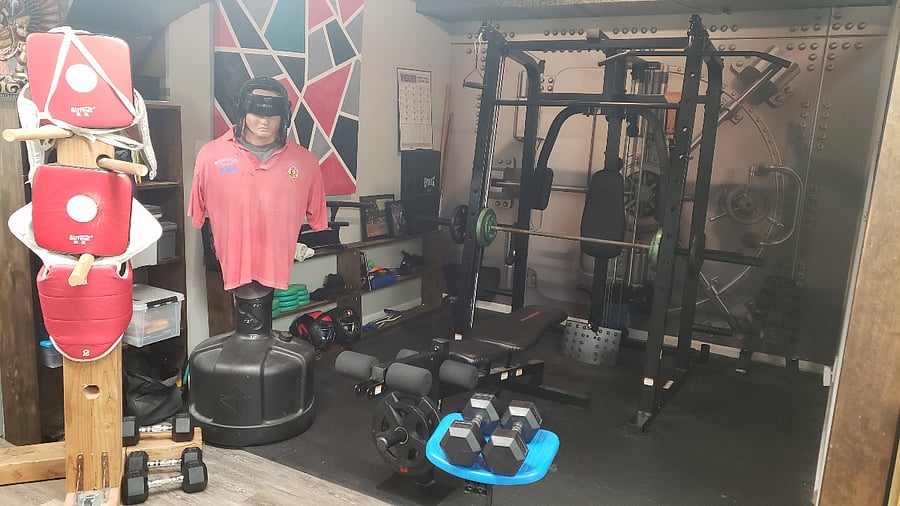 gym room inside the home near games room
