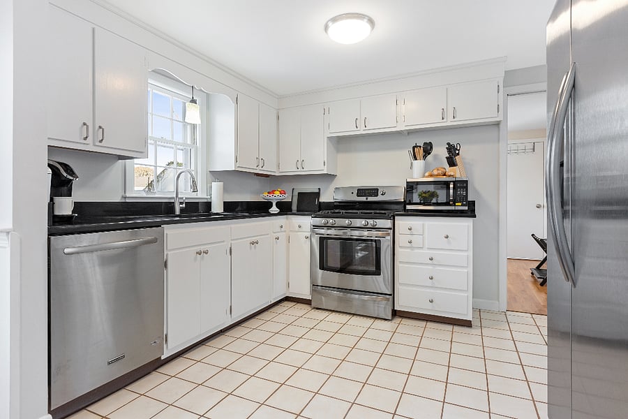 Kitchen w/ dishwasher, range, brand new refrigerator & microwave