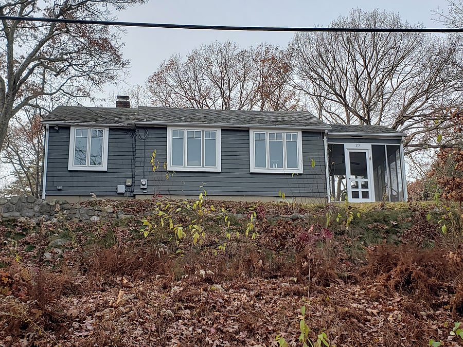 Street side of house up on hill