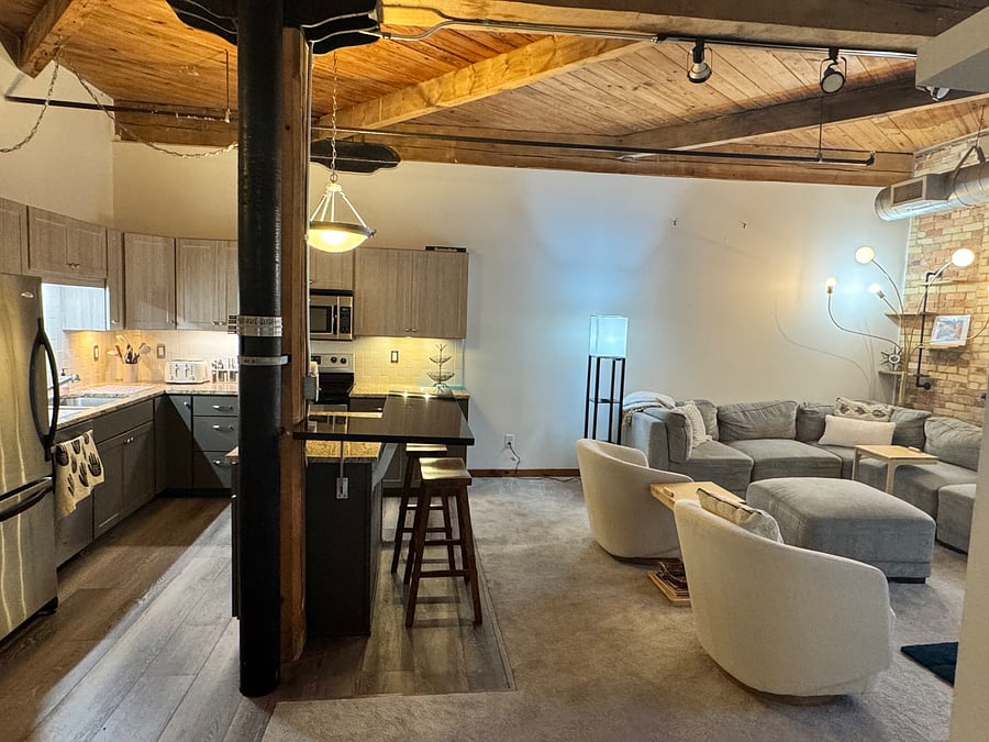 Kitchen and living room from entry door