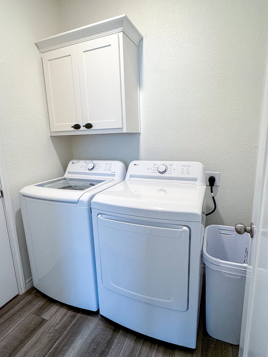Full size washer and dryer. What can I say? You're clothes go in stinky and come out not stinky :)