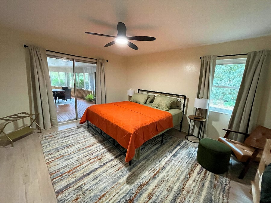 Main bedroom with access to screened porch
