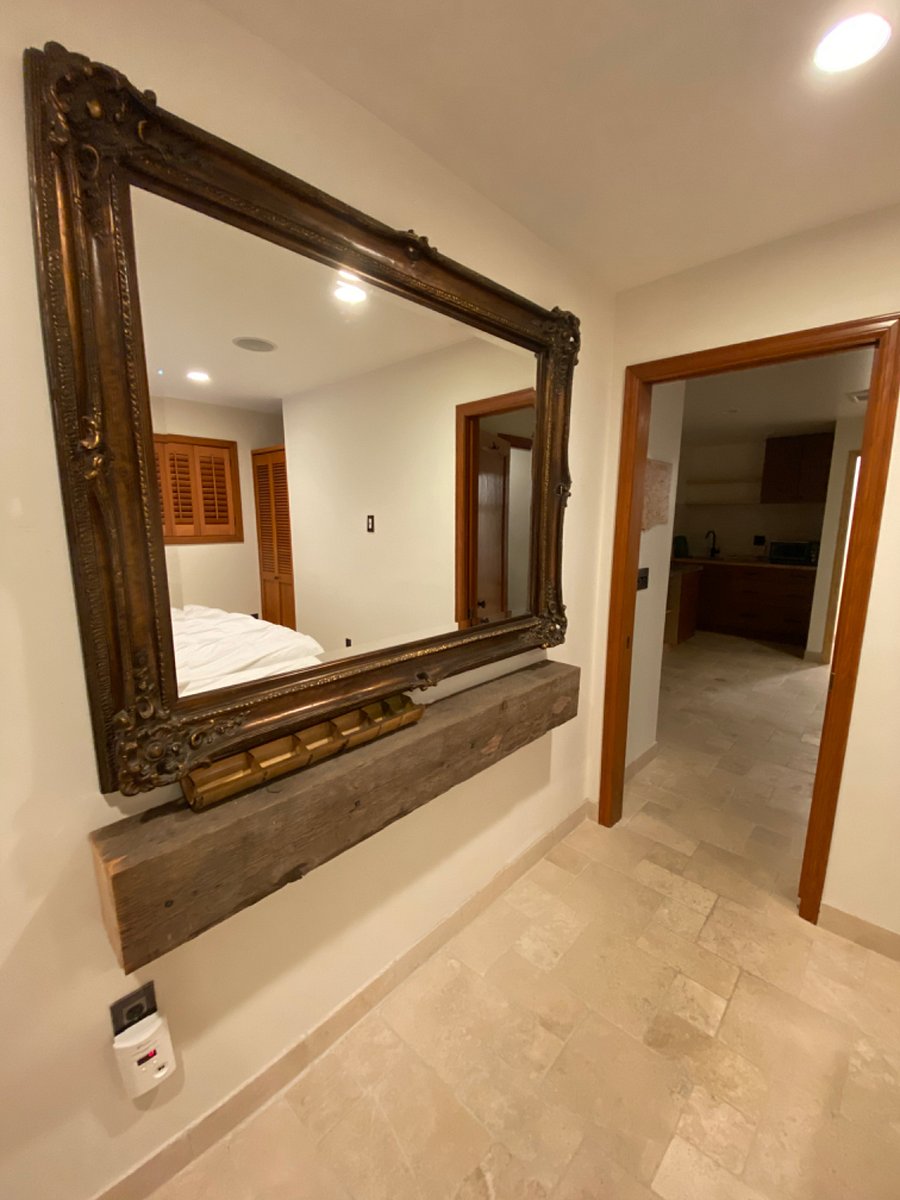 Pocket door between the rooms, large vintage mirror