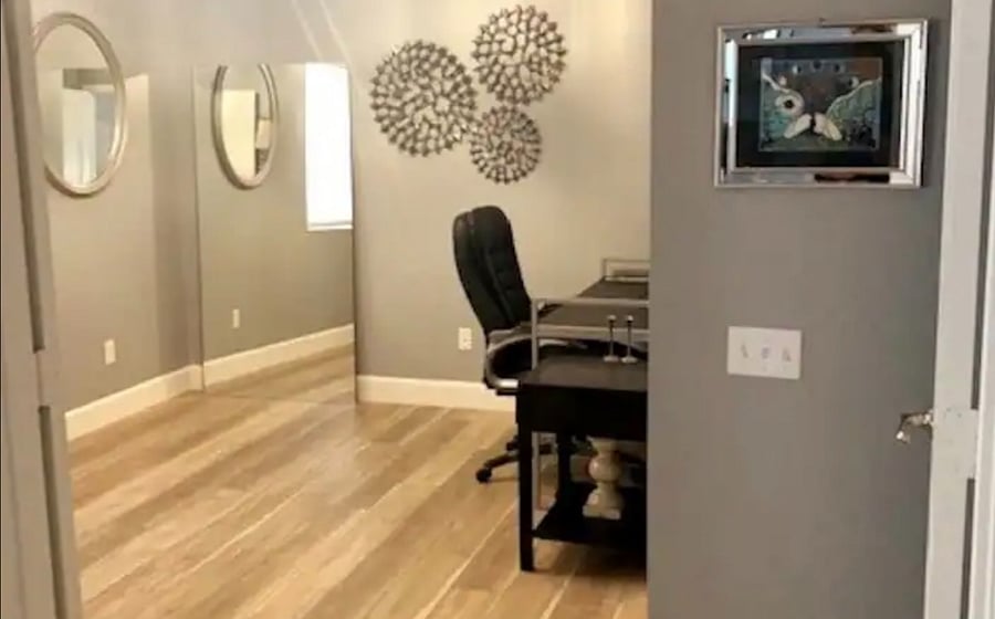 Office with desk, double doors to close room off for privacy