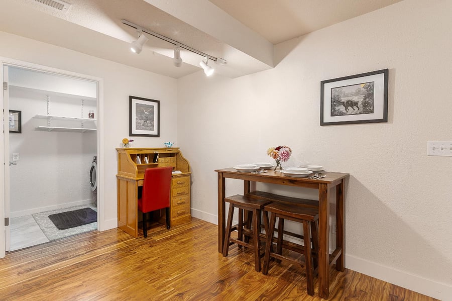 The dining table can be pushed against the wall to create more space.