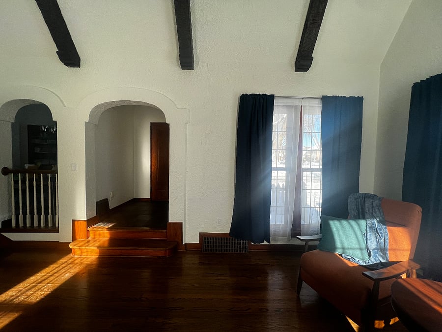 Living room, entry hall and arch to dining. Room.