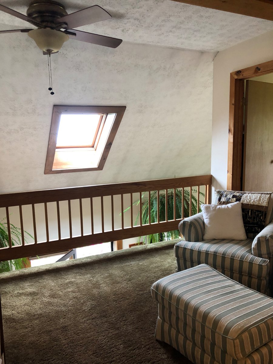 Upstairs seating area with sky light