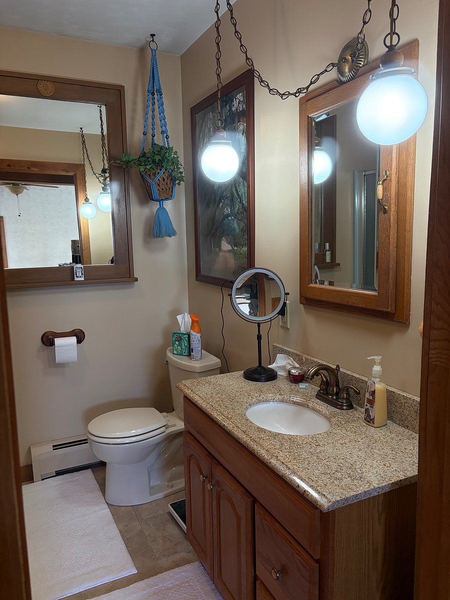 Second level bath with shower. Laundry chute to basement laundry room