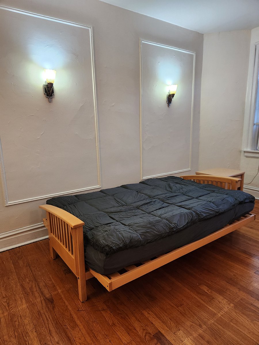 Futon converts to full bed. The futon bed contains an additional mattress topper.