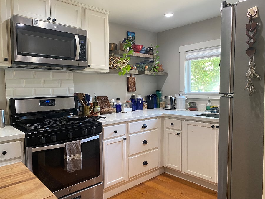 Furnished kitchen with all the appliances a chef could need as well as gas burners, microwave, oven, fridge and dedicated pantry storage for you.