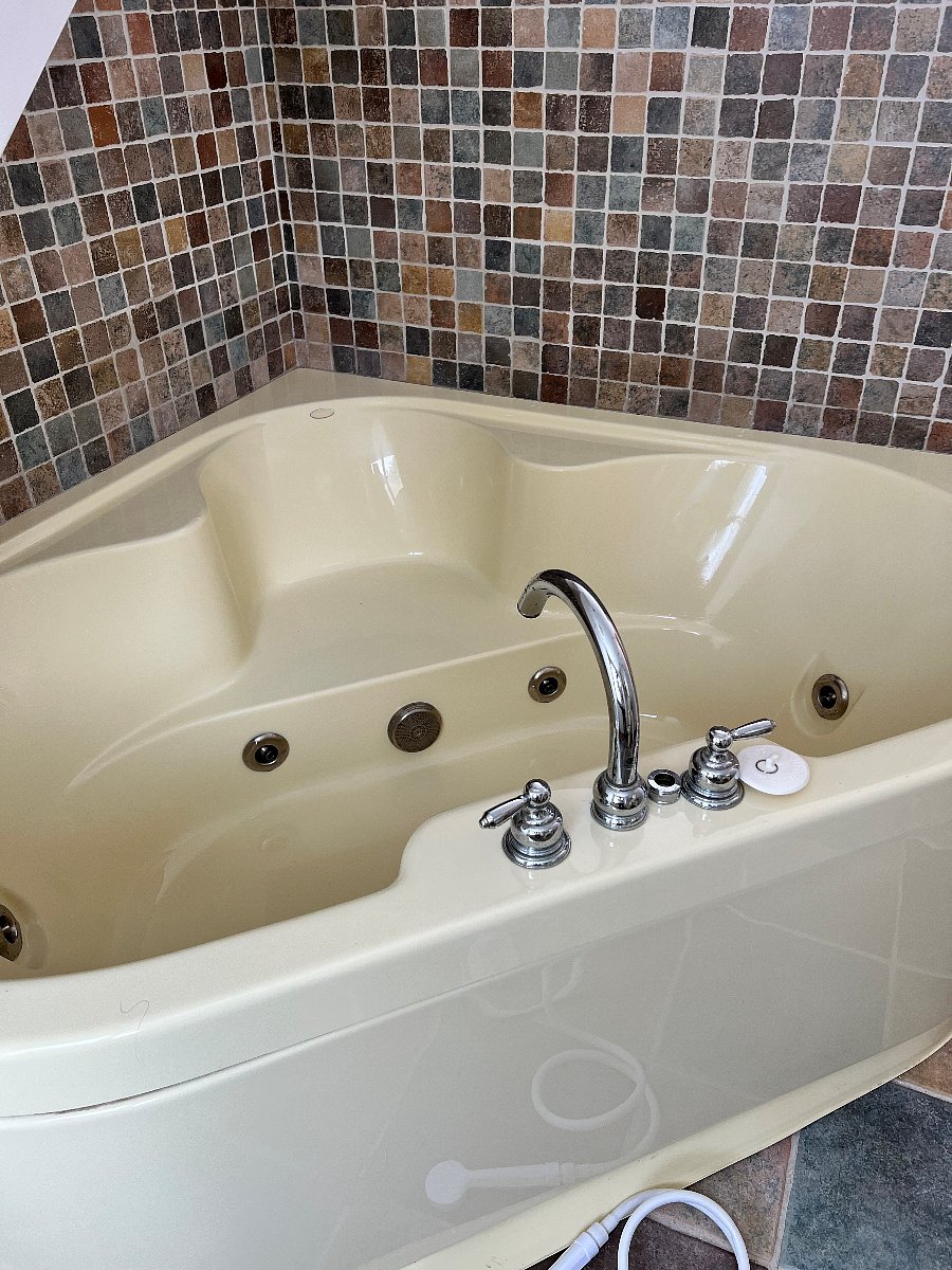 This is the jacuzzi tub in the bathroom that is private/attached to primary bedroom.