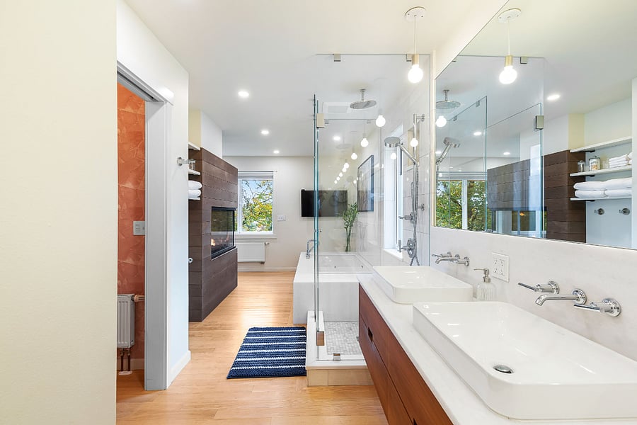 Ensuite bathroom includes a large soaking tub, rainforest shower (with a privacy window), double sinks, plenty of counter space, excellent lighting, and a warm water bidet.