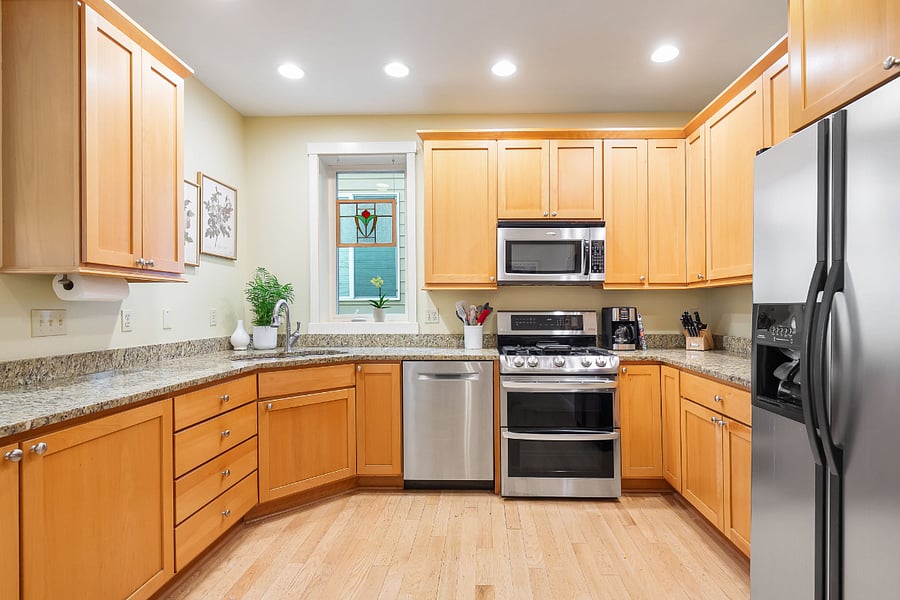 Large open kitchen with ample counter and cabinet space. We are cooks and bakers and have stocked this kitchen with appliances and tools we would love.